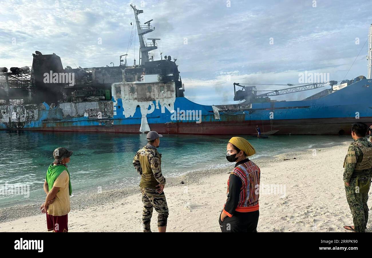 230330 -- BASILAN PROVINCE, March 30, 2023  -- The damaged M/V Lady Mary Joy 3 is seen along the coast of Basilan Province, the Philippines, March 30, 2023. A ferry carrying more than 200 people caught fire in the southern Philippines late Wednesday night, killing at least 10 passengers, the Philippine Coast Guard PCG said Thursday. Pilas Island Local Government/Handout via  THE PHILIPPINES-BASILAN PROVINCE-FERRY FIRE Xinhua PUBLICATIONxNOTxINxCHN Stock Photo