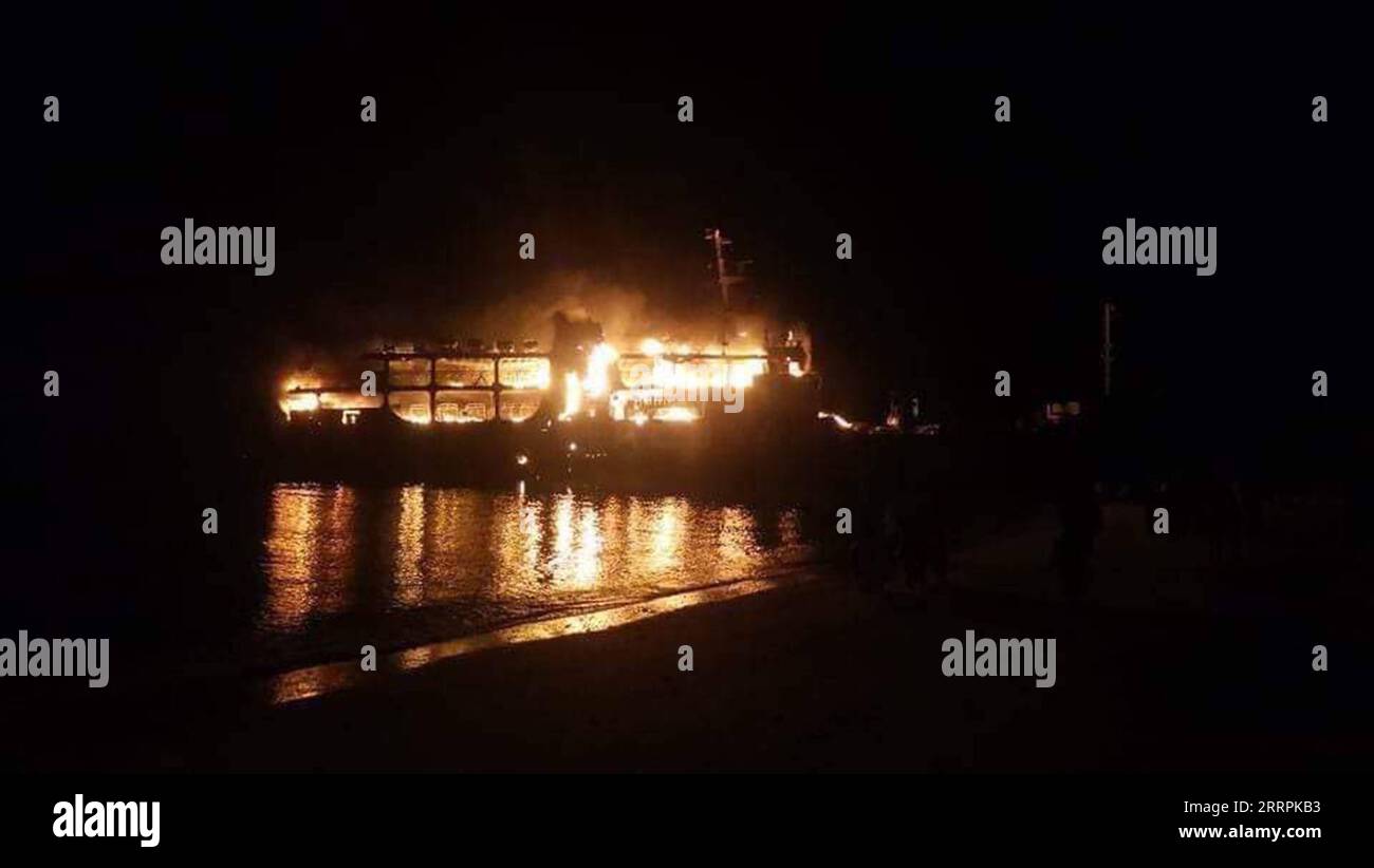 230330 -- BASILAN PROVINCE, March 30, 2023  -- The burning M/V Lady Mary Joy 3 is seen along the coast of Basilan Province, the Philippines, March 30, 2023. A ferry carrying more than 200 people caught fire in the southern Philippines late Wednesday night, killing at least 10 passengers, the Philippine Coast Guard PCG said Thursday. Coast Guard Station Basilan/Handout via  THE PHILIPPINES-BASILAN PROVINCE-FERRY FIRE Xinhua PUBLICATIONxNOTxINxCHN Stock Photo