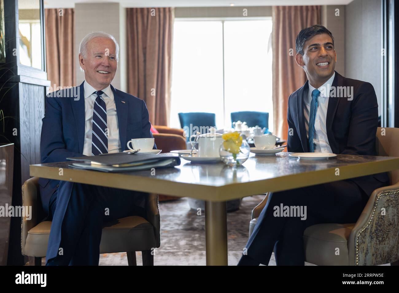 230412 -- BELFAST, April 12, 2023 -- British Prime Minister Rishi Sunak R meets with U.S. President Joe Biden in Belfast, Northern Ireland, the United Kingdom, on April 12, 2023. During his visit to Belfast on Wednesday, U.S. President Joe Biden called for the restoration of the power-sharing government in Northern Ireland. However, analysts do not expect his plea to lead to significant change. /Handout via Xinhua UK-NORTHERN IRELAND-BELFAST-U.S.-PRESIDENT-VISIT SimonxWalker/Nox10xDowningxStreet PUBLICATIONxNOTxINxCHN Stock Photo