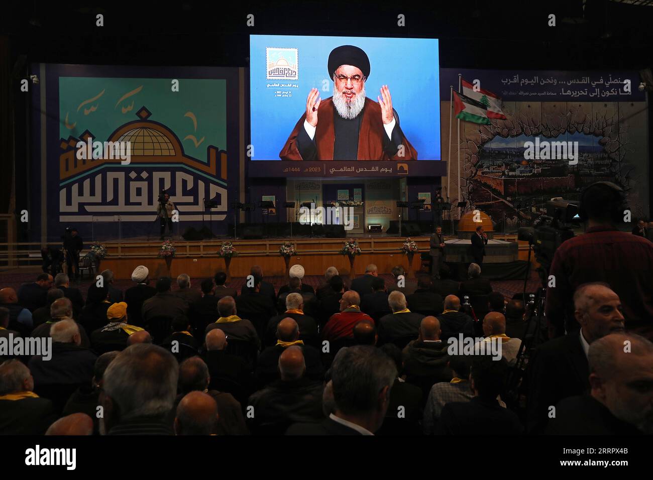 230415 BEIRUT, April 15, 2023 A screen shows Lebanon s Hezbollah leader Sayyed Hassan