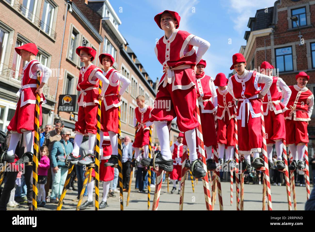 230416 -- NAMUR, April 16, 2023 -- Stilt walkers take part in a parade