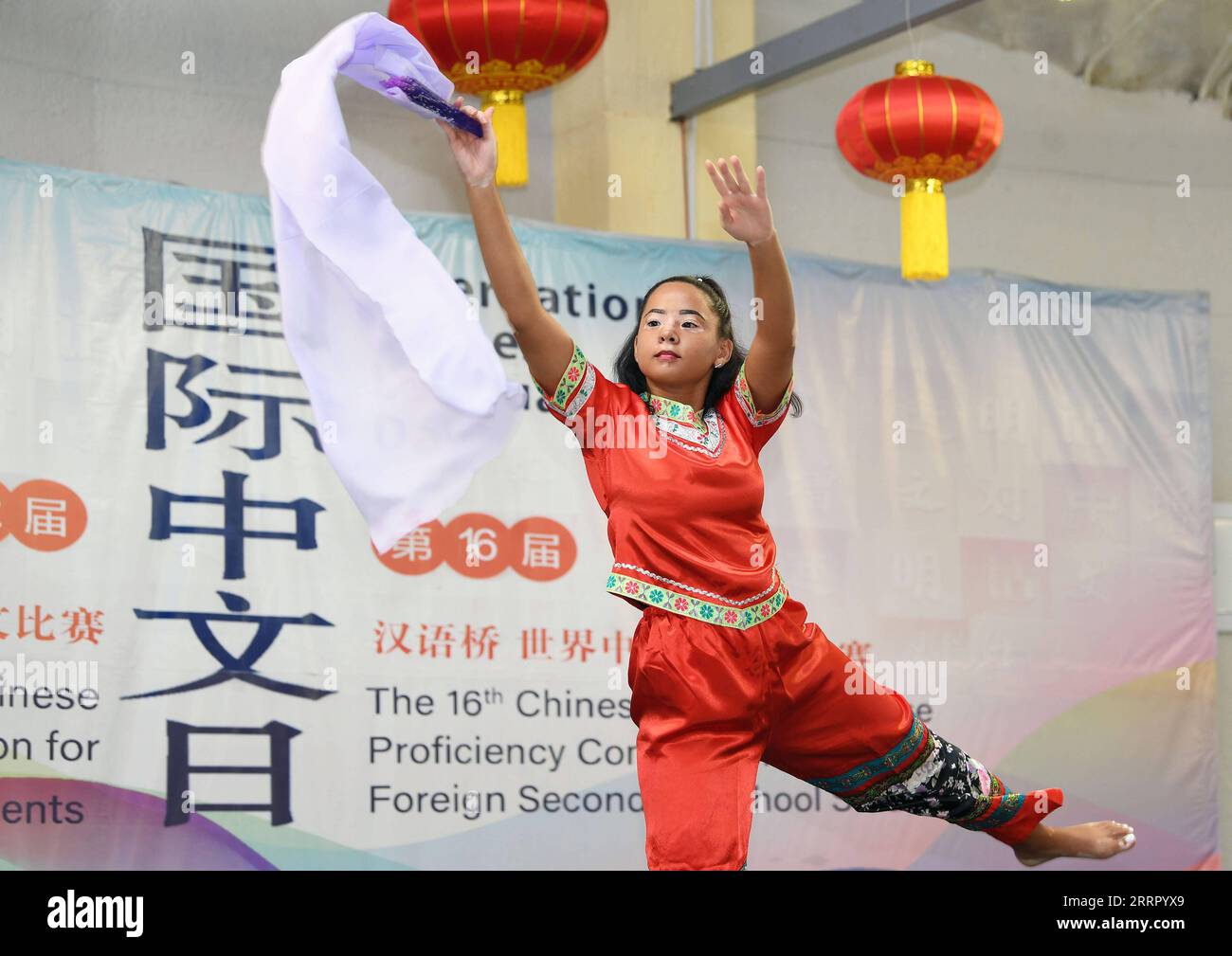 230419 -- WINDHOEK, April 19, 2023 -- Sophomore at the University of  Namibia Natacha Van Wyk performs a traditional Chinese dance during the UN  Chinese Language Day event in Windhoek, Namibia, on