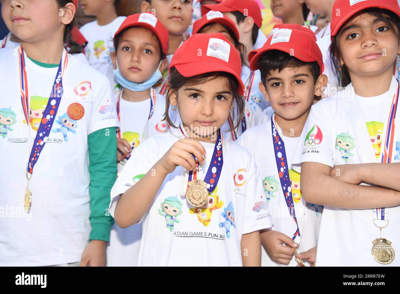 230511 TEHERAN, May 11, 2023 Young runners pose with medals after
