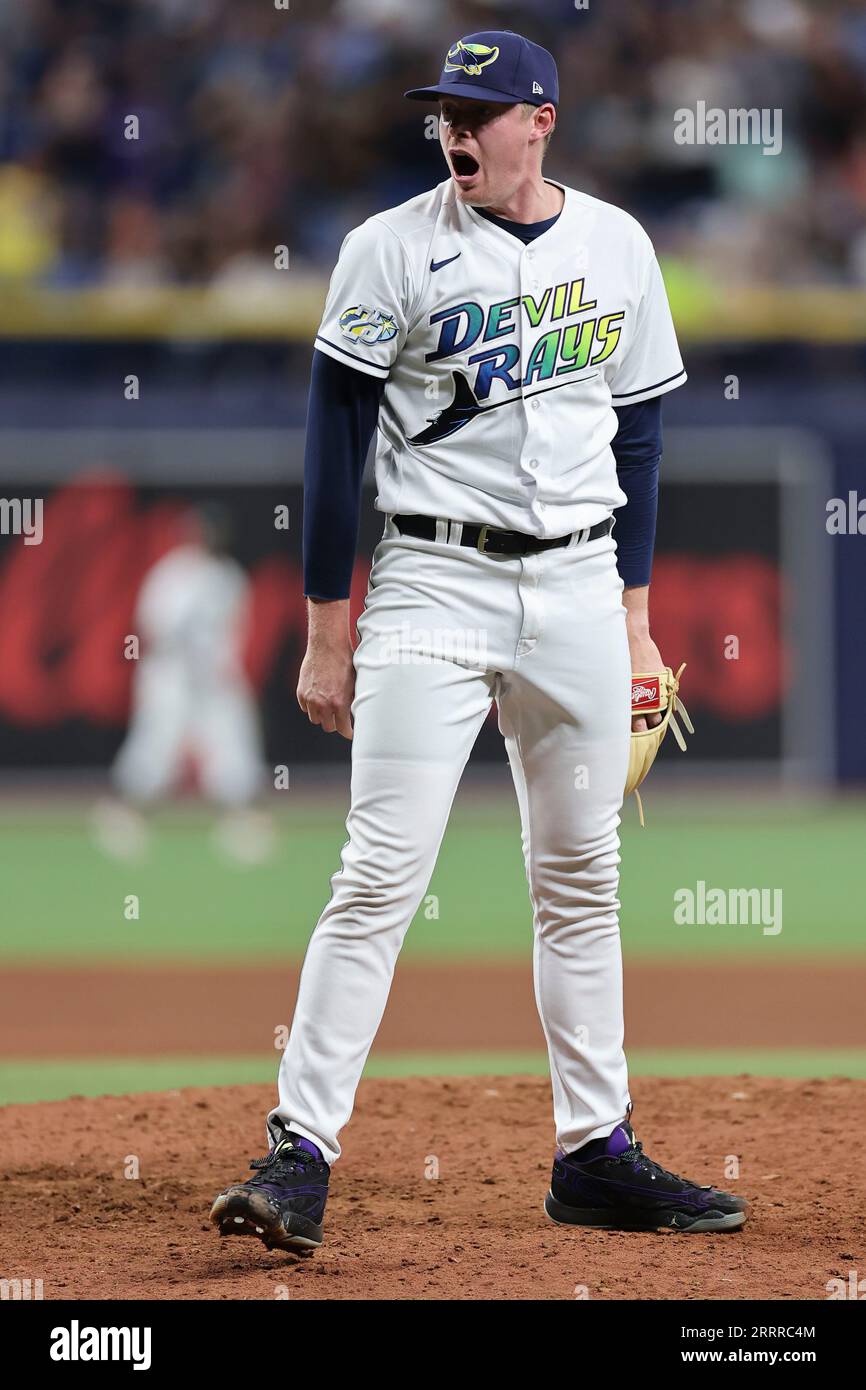 St. Petersburg, FL USA; Tampa Bay Rays relief pitcher Pete Fairbanks (29) yells and cheers to celebrate the win during an MLB game against the Seattle Stock Photo