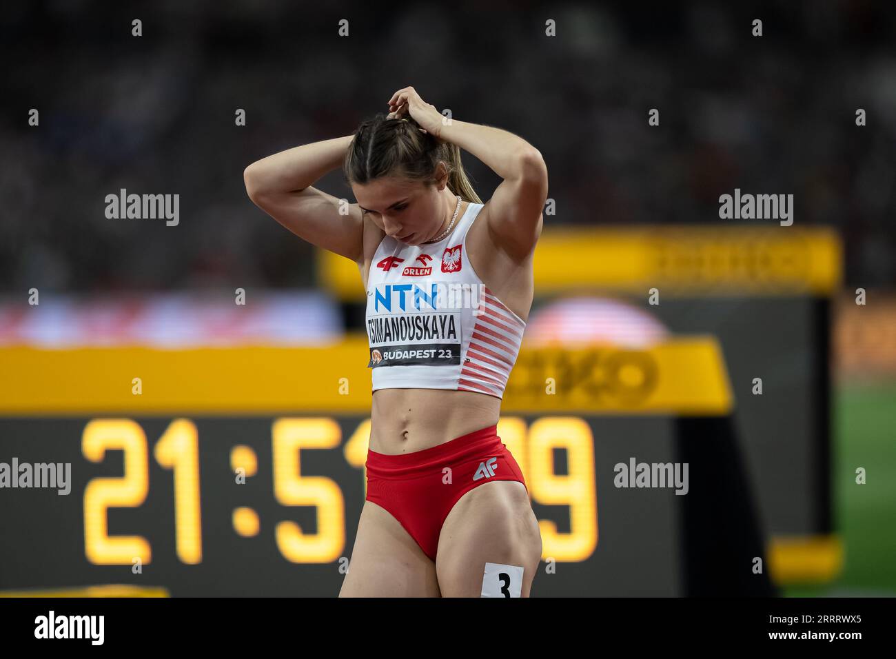 Kristina Timanóvskaya participating in the 4X100 meters relay at the ...