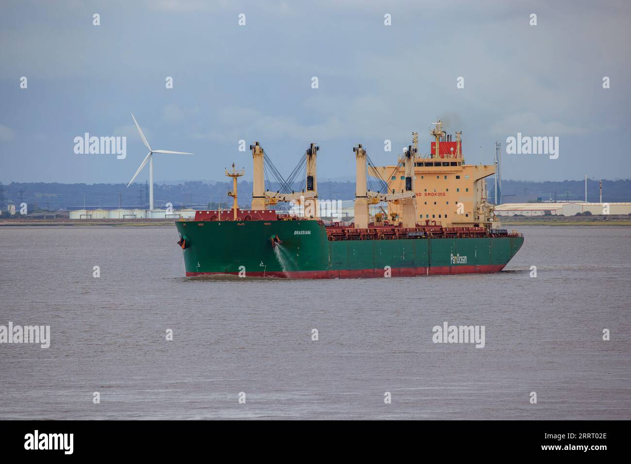 Bulk carrier Brassiana heading out to sea Stock Photo