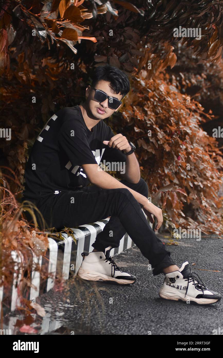 Rajput boy is sitting in a stylish pose