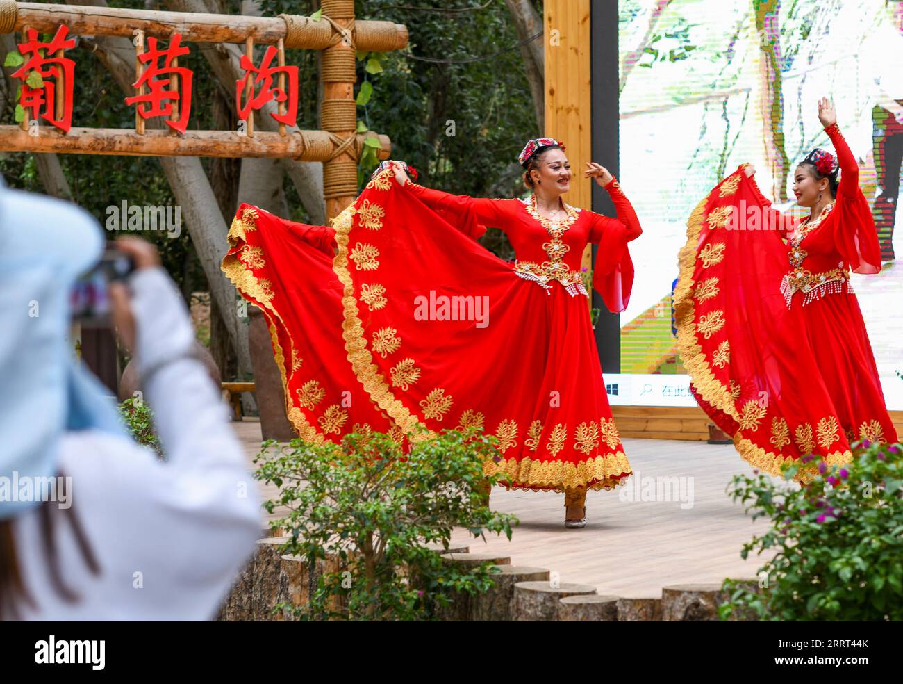 230628 -- URUMQI, June 28, 2023 -- A performance is staged at the Grape Valley scenic area in Turpan, northwest China s Xinjiang Uygur Autonomous Region, June 26, 2023. The city of Turpan has received 2.53 million tourist visits from June 1 to 28, an increase of nearly 40 percent over the same period in 2022.  CHINA-XINJIANG-TURPAN-TOURISM CN WangxFei PUBLICATIONxNOTxINxCHN Stock Photo