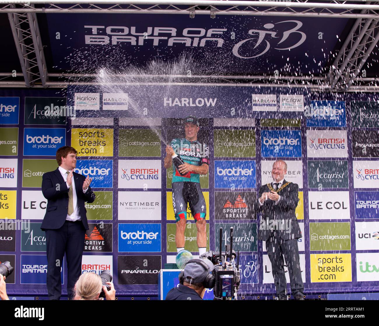 Danny Van Poppel Tour of Britain Stage 6 Winner Spraying Champagne on the Podium Harlow Essex following Presentation Stock Photo