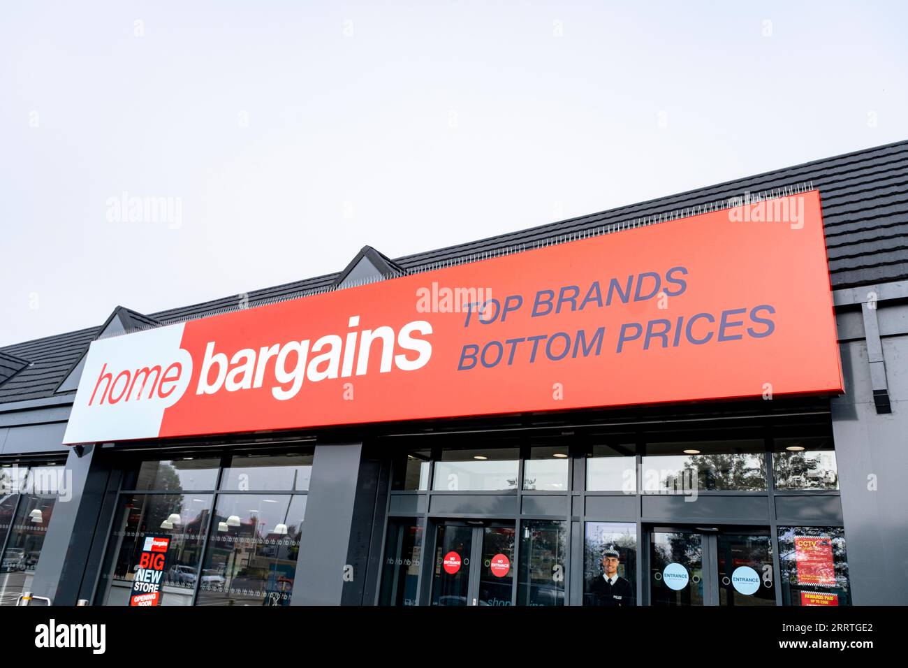 Close up of Home bargains store sign on outside wall UK Stock Photo