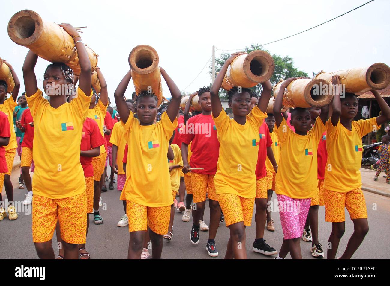230725 -- PORTO-NOVO, July 25, 2023 -- People take part in a parade of
