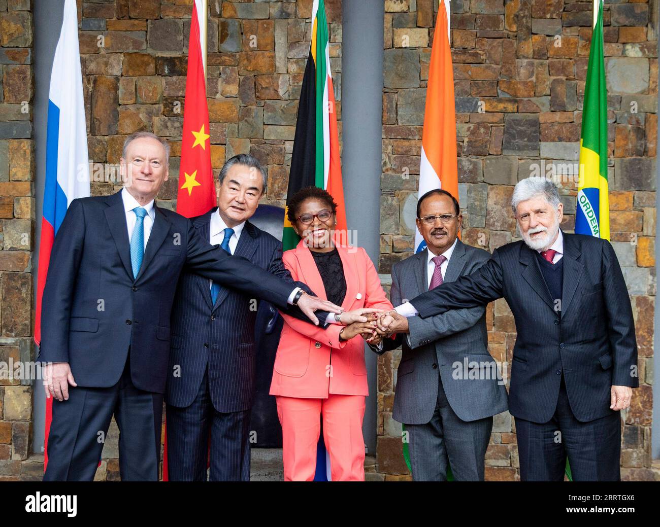 230725 -- JOHANNESBURG, July 25, 2023 -- Wang Yi 2nd L, a member of the Political Bureau of the Communist Party of China CPC Central Committee and director of the Office of the CPC Central Commission for Foreign Affairs, poses for a group photo with Khumbudzo Ntshavheni C, minister in the Presidency of South Africa, Celso Luiz Nunes Amorim 1st R, chief adviser of the Presidency of Brazil, Nikolai Patrushev 1st L, secretary of the Security Council of Russia, and National Security Adviser of India Ajit Doval 2nd R at the 13th Meeting of BRICS National Security Advisers and High Representatives o Stock Photo
