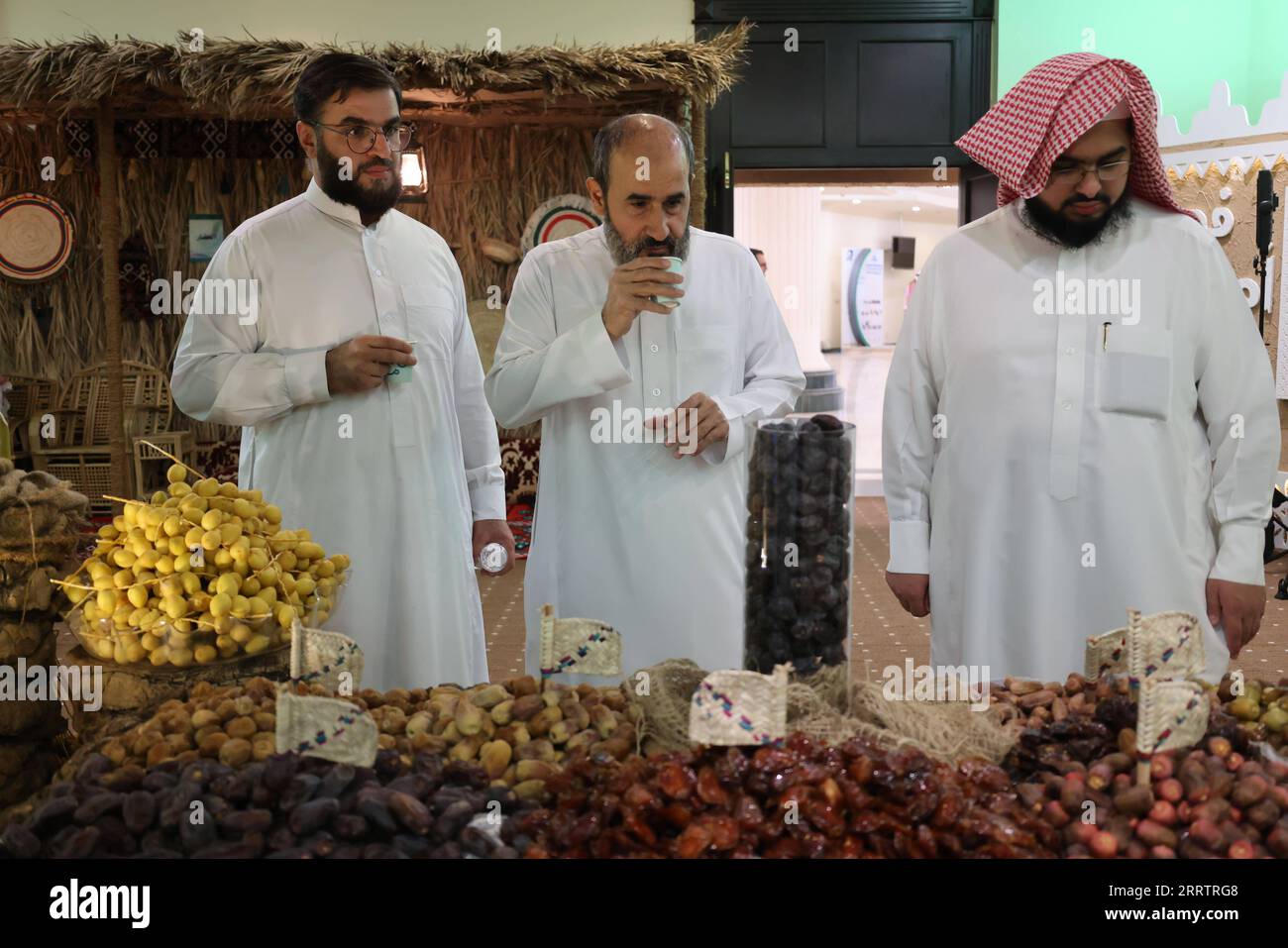 230807 -- QASSIM SAUDI ARABIA, Aug. 7, 2023 -- People select dates at