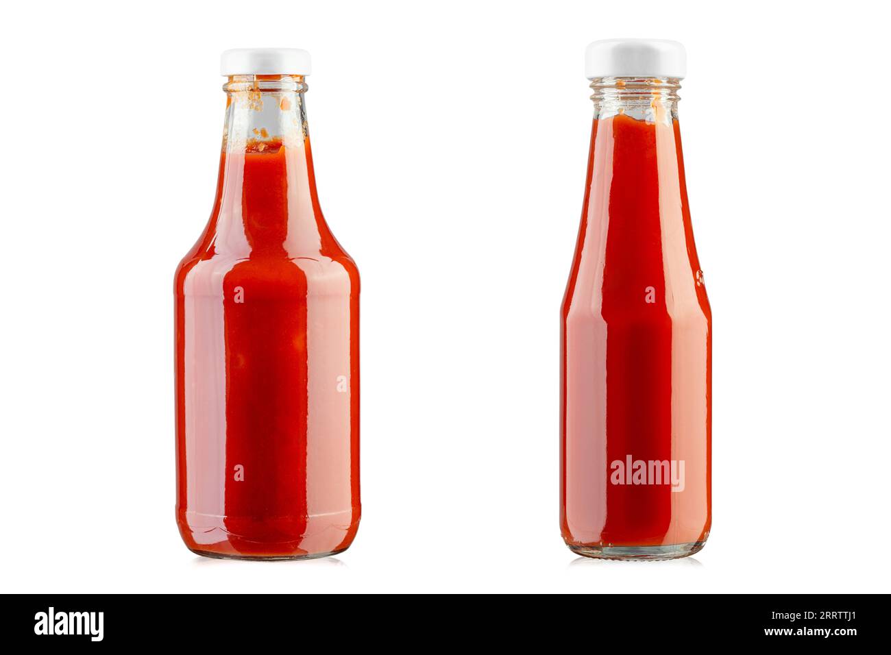 Collection of glass bottles of ketchup isolated on white background