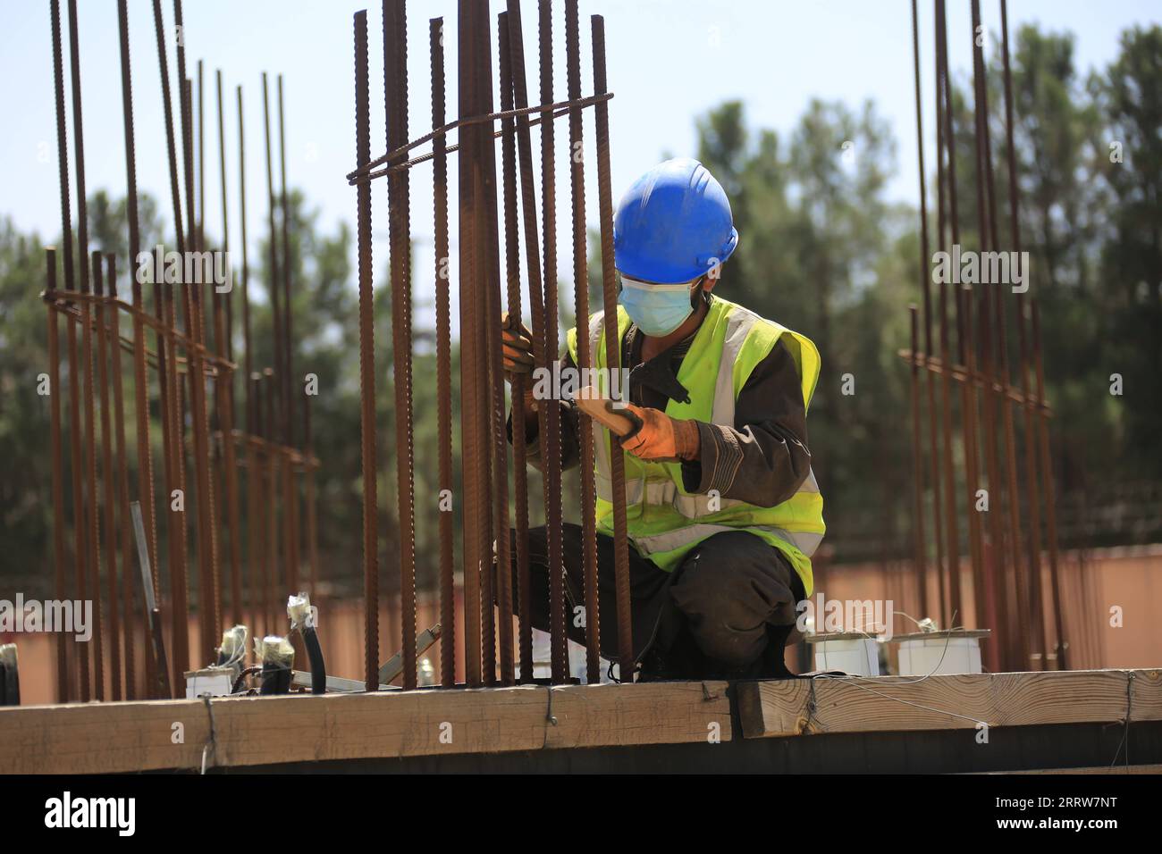 230815 -- KABUL, Aug. 15, 2023 -- An Afghan employee works at the construction site of a China-funded housing complex in Kabul, Afghanistan, Aug. 13, 2023. TO GO WITH Feature: Afghan staffer makes big stride in China-invested project Photo by /Xinhua AFGHANISTAN-KABUL-CHINA-INVESTED PROJECT-AFGHAN STAFFER SaifurahmanxSafi PUBLICATIONxNOTxINxCHN Stock Photo