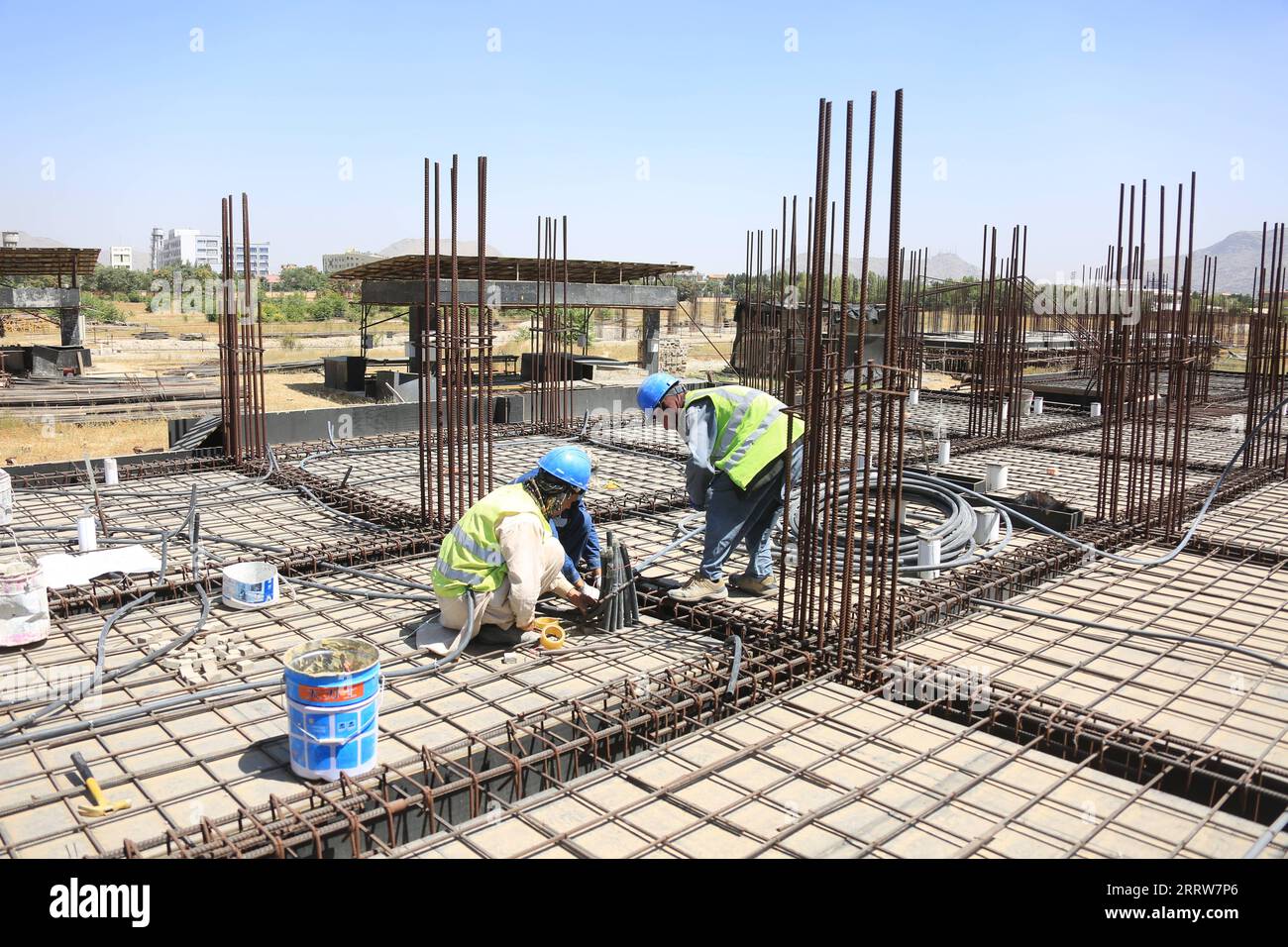 230815 -- KABUL, Aug. 15, 2023 -- Afghan employees work at the construction site of a China-funded housing complex in Kabul, Afghanistan, Aug. 13, 2023. TO GO WITH Feature: Afghan staffer makes big stride in China-invested project Photo by /Xinhua AFGHANISTAN-KABUL-CHINA-INVESTED PROJECT-AFGHAN STAFFER SaifurahmanxSafi PUBLICATIONxNOTxINxCHN Stock Photo