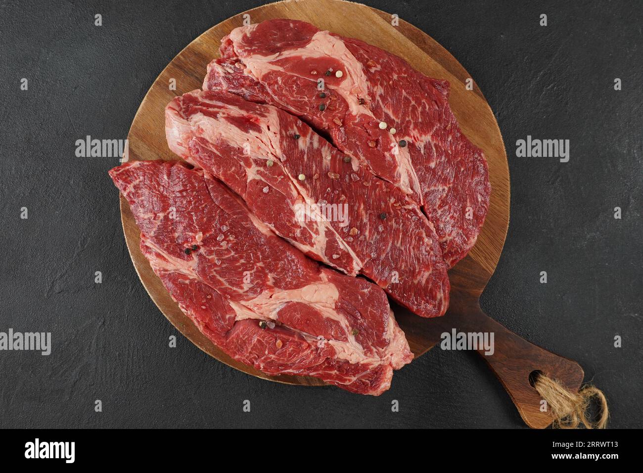 Plain fresh cut chuck steak prepared for cooking Stock Photo Alamy