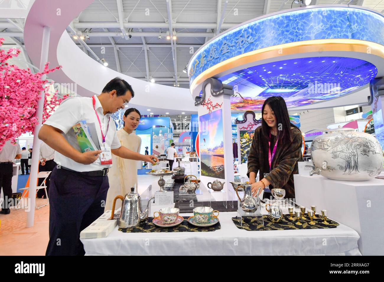 230901 -- TIANJIN, Sept. 1, 2023 -- People visit the 13th China Tourism Industry Exposition in north China s Tianjin Municipality, Sept. 1, 2023. The expo kicked off in Tianjin on Friday, highlighting international cooperation and industrial innovation in the culture and tourism sector. The three-day event, featuring a wide range of activities, including exhibitions, specialized forums and business negotiations, has attracted more than 2,000 cultural and tourism enterprises.  CHINA-TIANJIN-TOURISM INDUSTRY EXPOSITION-OPENING CN SunxFanyue PUBLICATIONxNOTxINxCHN Stock Photo