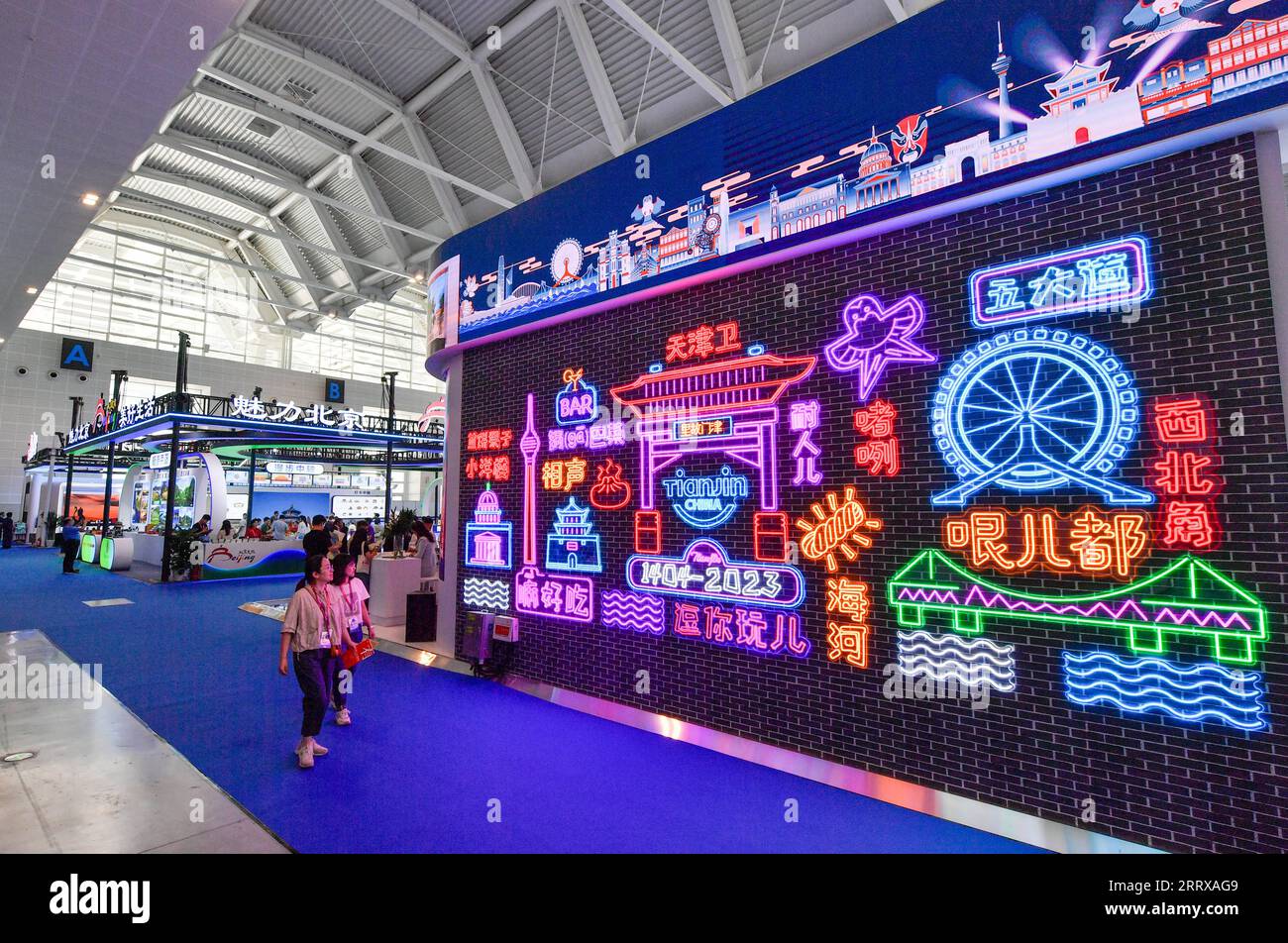 230901 -- TIANJIN, Sept. 1, 2023 -- People visit the 13th China Tourism Industry Exposition in north China s Tianjin Municipality, Sept. 1, 2023. The expo kicked off in Tianjin on Friday, highlighting international cooperation and industrial innovation in the culture and tourism sector. The three-day event, featuring a wide range of activities, including exhibitions, specialized forums and business negotiations, has attracted more than 2,000 cultural and tourism enterprises.  CHINA-TIANJIN-TOURISM INDUSTRY EXPOSITION-OPENING CN SunxFanyue PUBLICATIONxNOTxINxCHN Stock Photo