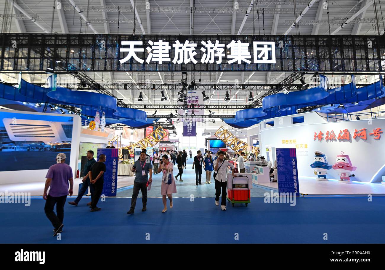 230901 -- TIANJIN, Sept. 1, 2023 -- People visit the 13th China Tourism Industry Exposition in north China s Tianjin Municipality, Sept. 1, 2023. The expo kicked off in Tianjin on Friday, highlighting international cooperation and industrial innovation in the culture and tourism sector. The three-day event, featuring a wide range of activities, including exhibitions, specialized forums and business negotiations, has attracted more than 2,000 cultural and tourism enterprises.  CHINA-TIANJIN-TOURISM INDUSTRY EXPOSITION-OPENING CN SunxFanyue PUBLICATIONxNOTxINxCHN Stock Photo