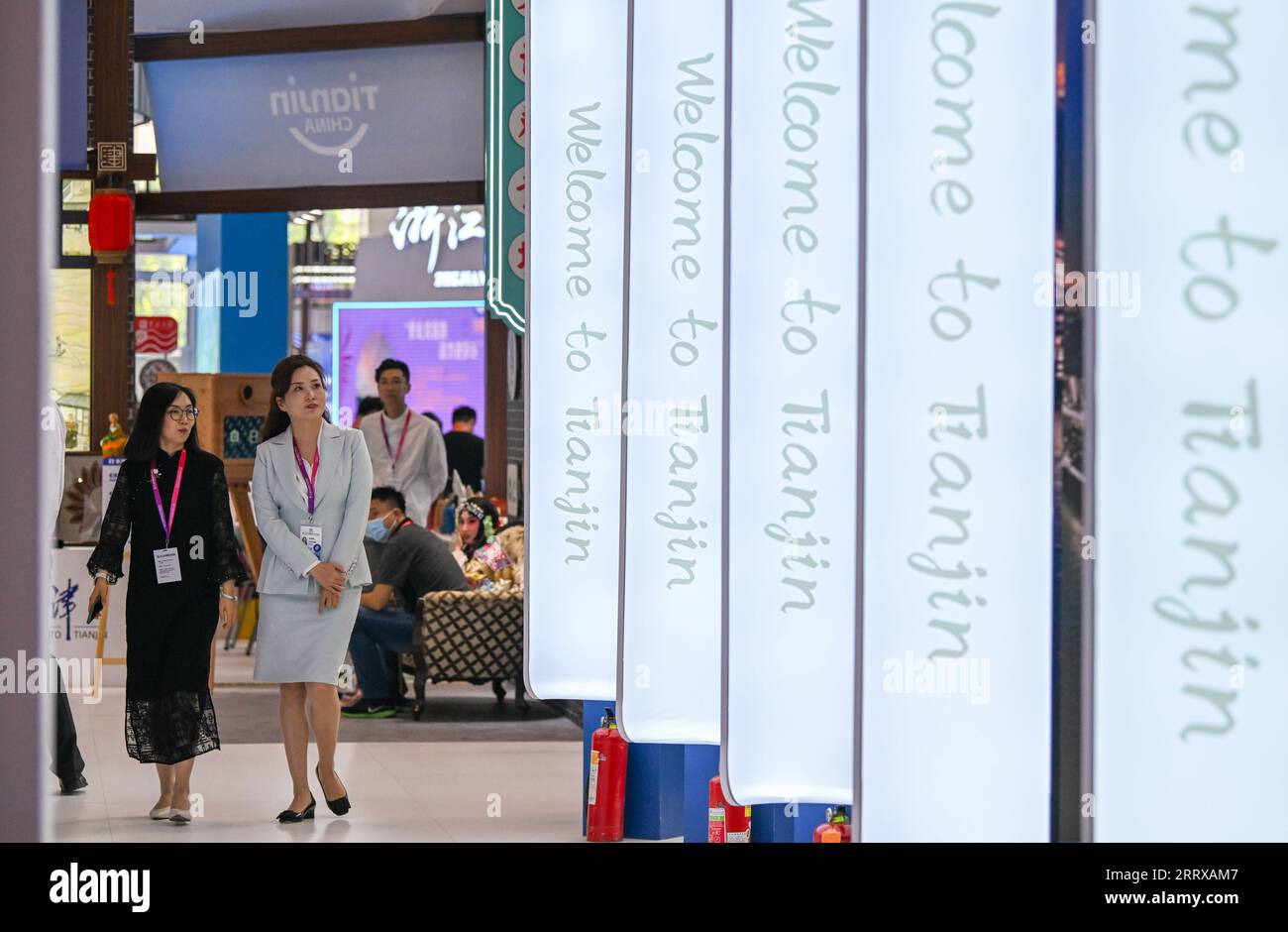 230901 -- TIANJIN, Sept. 1, 2023 -- People visit the 13th China Tourism Industry Exposition in north China s Tianjin Municipality, Sept. 1, 2023. The expo kicked off in Tianjin on Friday, highlighting international cooperation and industrial innovation in the culture and tourism sector. The three-day event, featuring a wide range of activities, including exhibitions, specialized forums and business negotiations, has attracted more than 2,000 cultural and tourism enterprises.  CHINA-TIANJIN-TOURISM INDUSTRY EXPOSITION-OPENING CN SunxFanyue PUBLICATIONxNOTxINxCHN Stock Photo