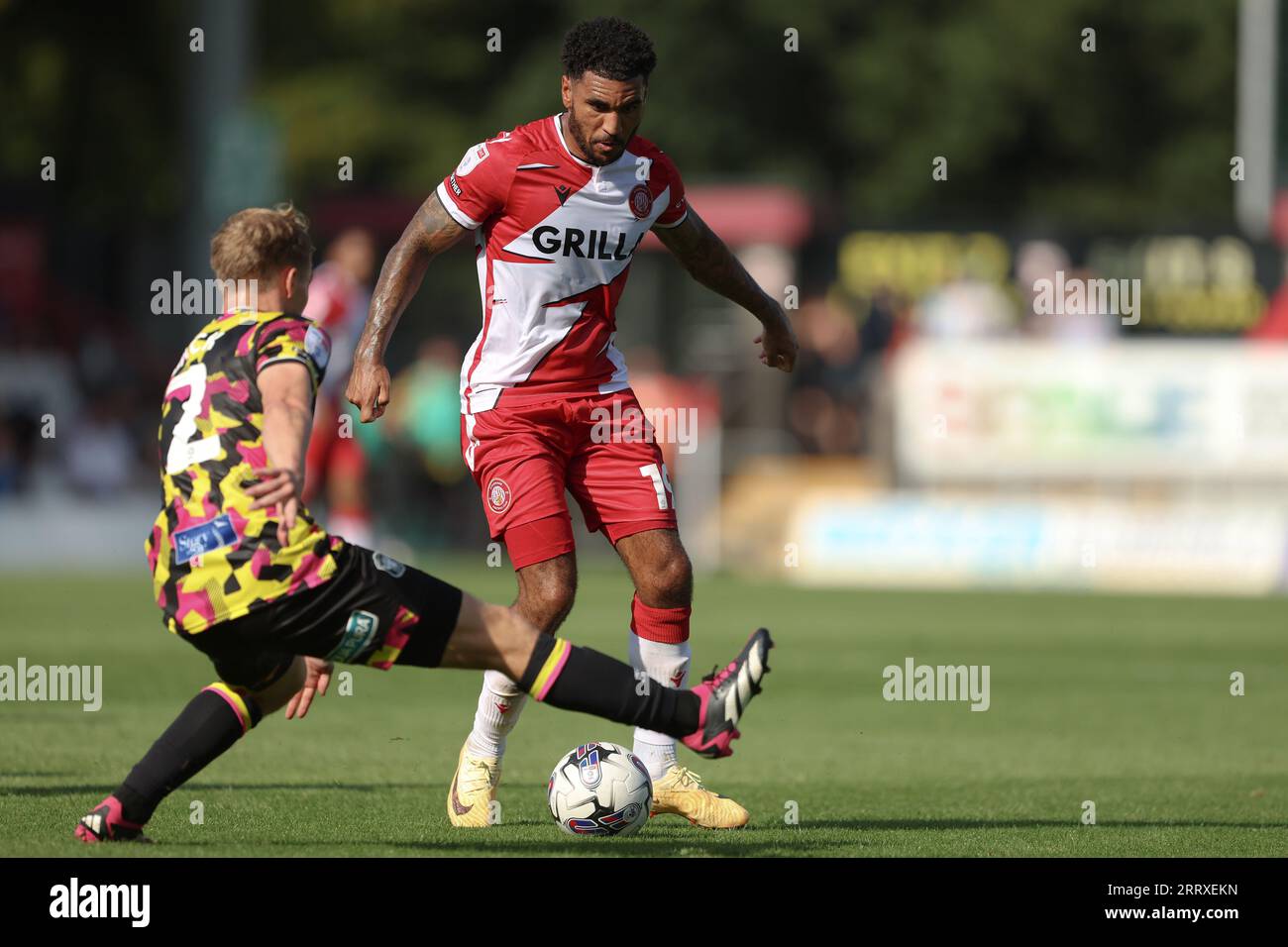 Stevenage's Jamie Reid (right) and Carlisle United's Finley Back battle ...