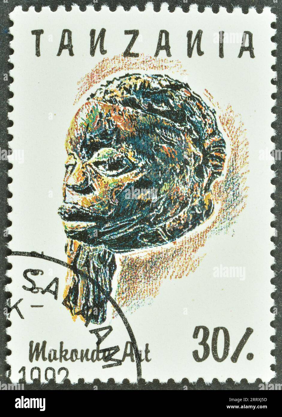 Cancelled postage stamp printed by Tanzania, that shows Head, Makonde Art, circa 1992. Stock Photo