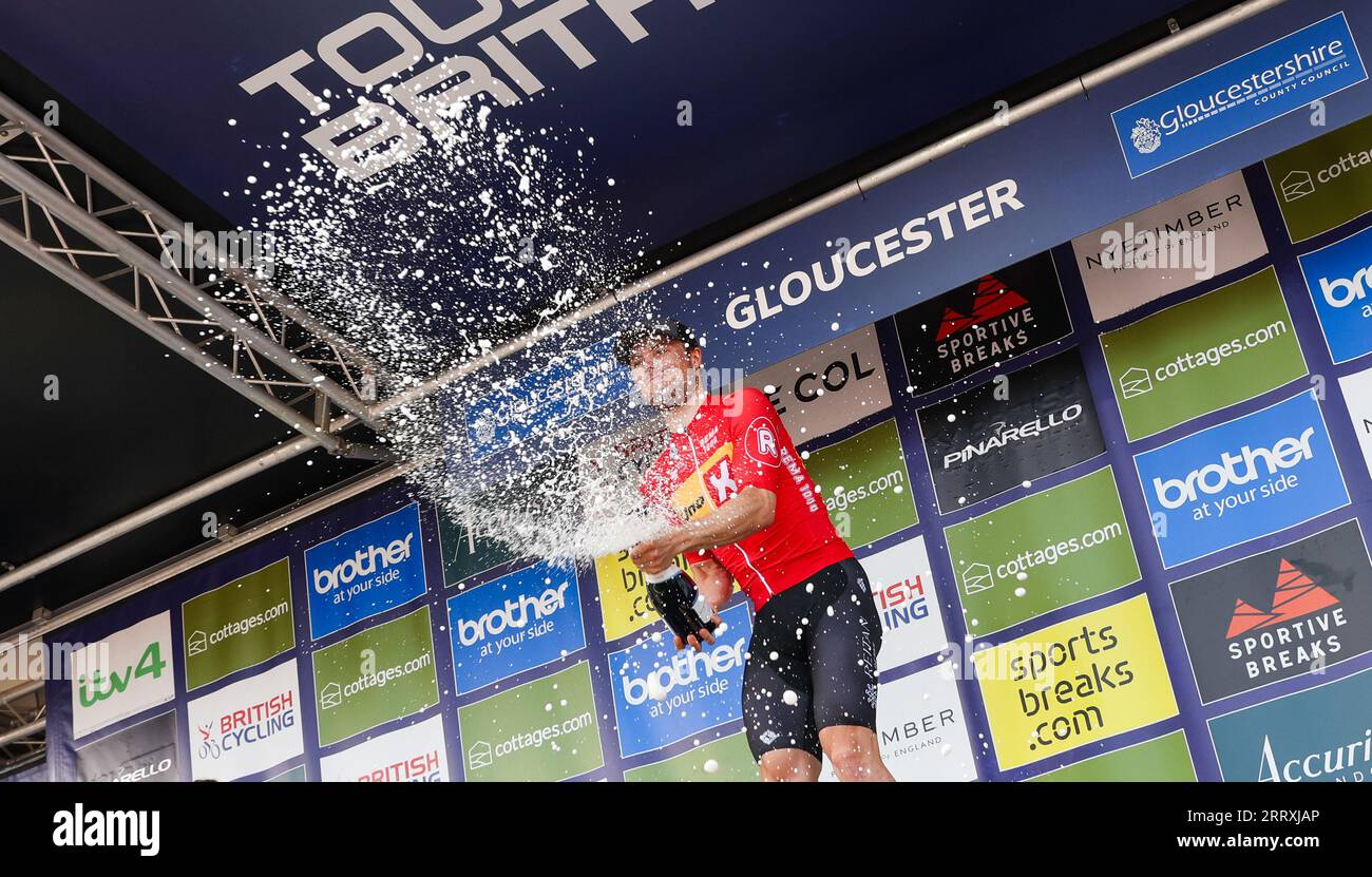 Stage winner Uno-X Pro Cycling Team's Rasmus Tiller celebrates on the podium following stage seven of the 2023 Tour of Britain, from Tewkesbury to Gloucester. Picture date: Saturday September 9, 2023. Stock Photo