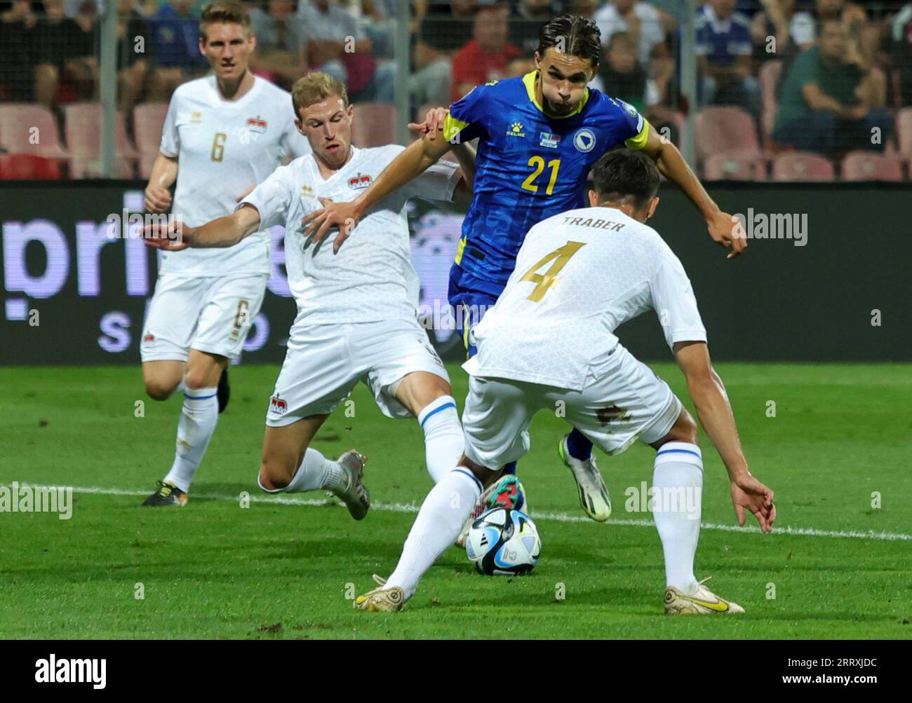 Zenica. 8th Sep, 2023. Amar Dedic (2nd R) of Bosnia and Herzegovina breaks through during the