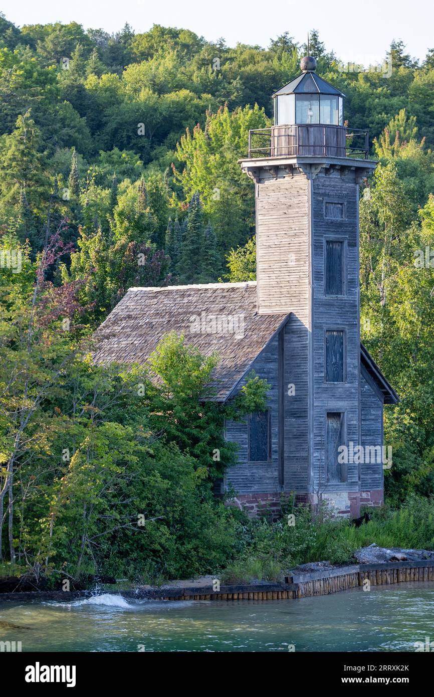 Wild black bear at the base of the East Channel Lighthouse in Munising
