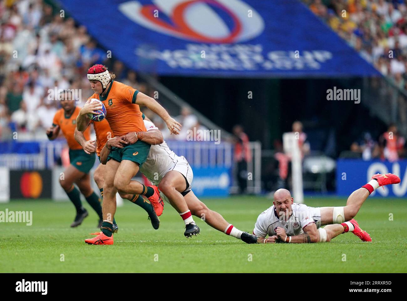 Australia's Fraser McReight (left) is tackled by Georgia's Nika ...