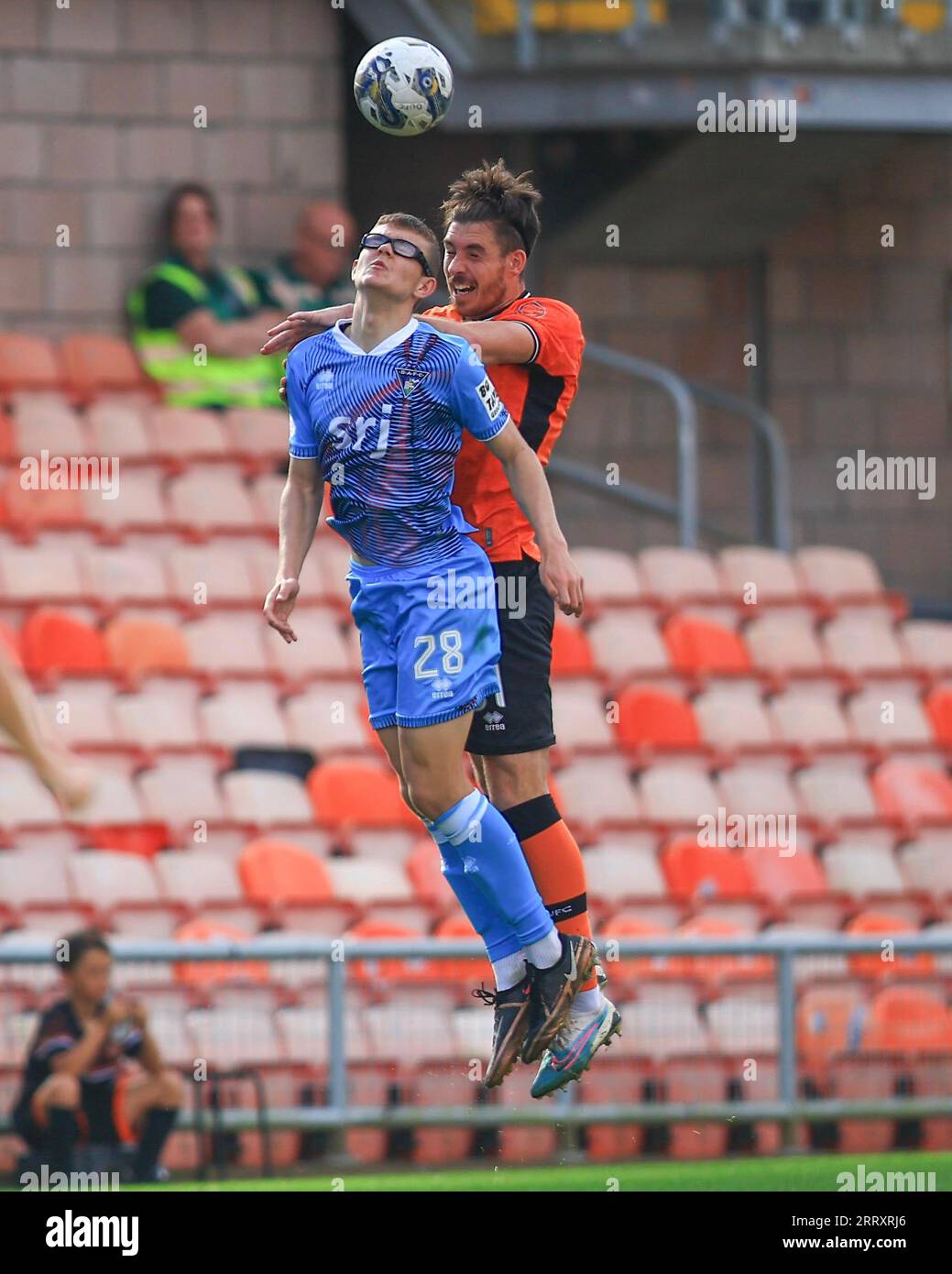 9th September 2023;  Tannadice Park, Dundee, Scotland: Scottish SPFL Trust Football, Dundee United versus Dunfermline; Declan Gallagher of Dundee United competes in the air with Andrew Tod of Dunfermline Athletic Stock Photo