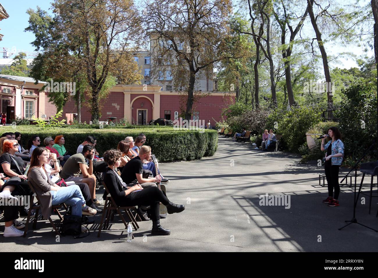 Odessa, Ukraine. 09th Sep, 2023. The poet Evelina Ganska is seen speaking to an audience at the courtyard of the Odessa Fine Arts Museum. Poetry readings took place in the courtyard of the Odessa Fine Arts Museum. Poets performed: Svitlana Povalyaeva and Evelina Ganska. Visitors heard works about the pain of a year and a half of war with the Russian Federation, the experience of personal and national tragedies. (Photo by Viacheslav Onyshchenko/SOPA Images/Sipa USA) Credit: Sipa USA/Alamy Live News Stock Photo