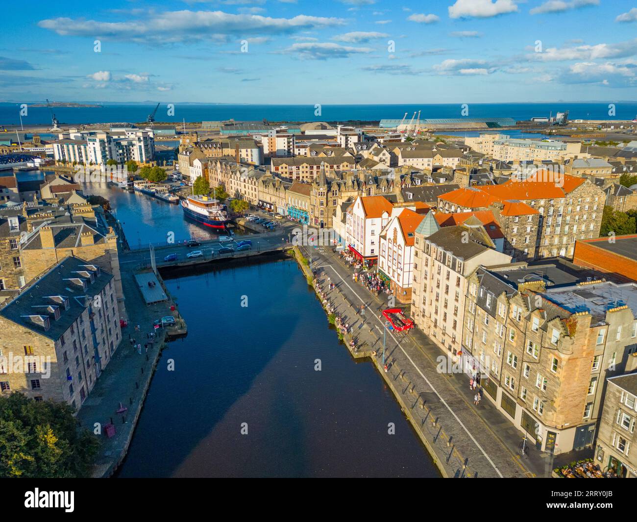 Aerial view in late afternoon of popular The Shore riverside district beside Leith Water river, Leith,  Edinburgh, Scotland, UK Stock Photo