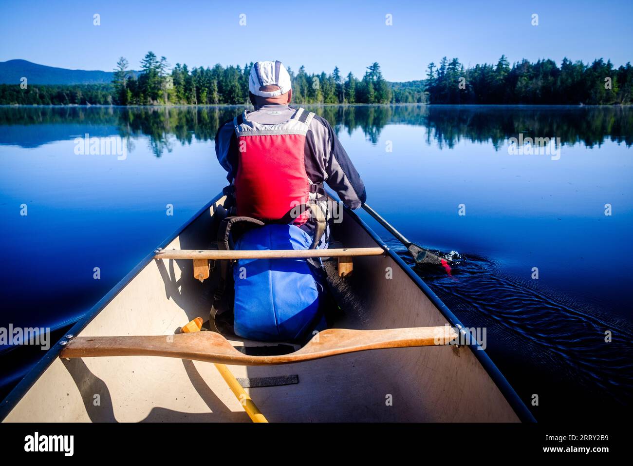 Canoeing in the Adirondack Mountains of New York State, USA, Essex Chain Lakes near Newcomb, NY, USA. Stock Photo