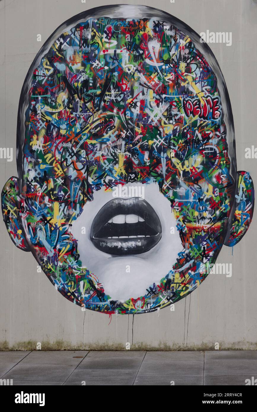 Mosaic face artistically painted on a wall in Norway Stock Photo