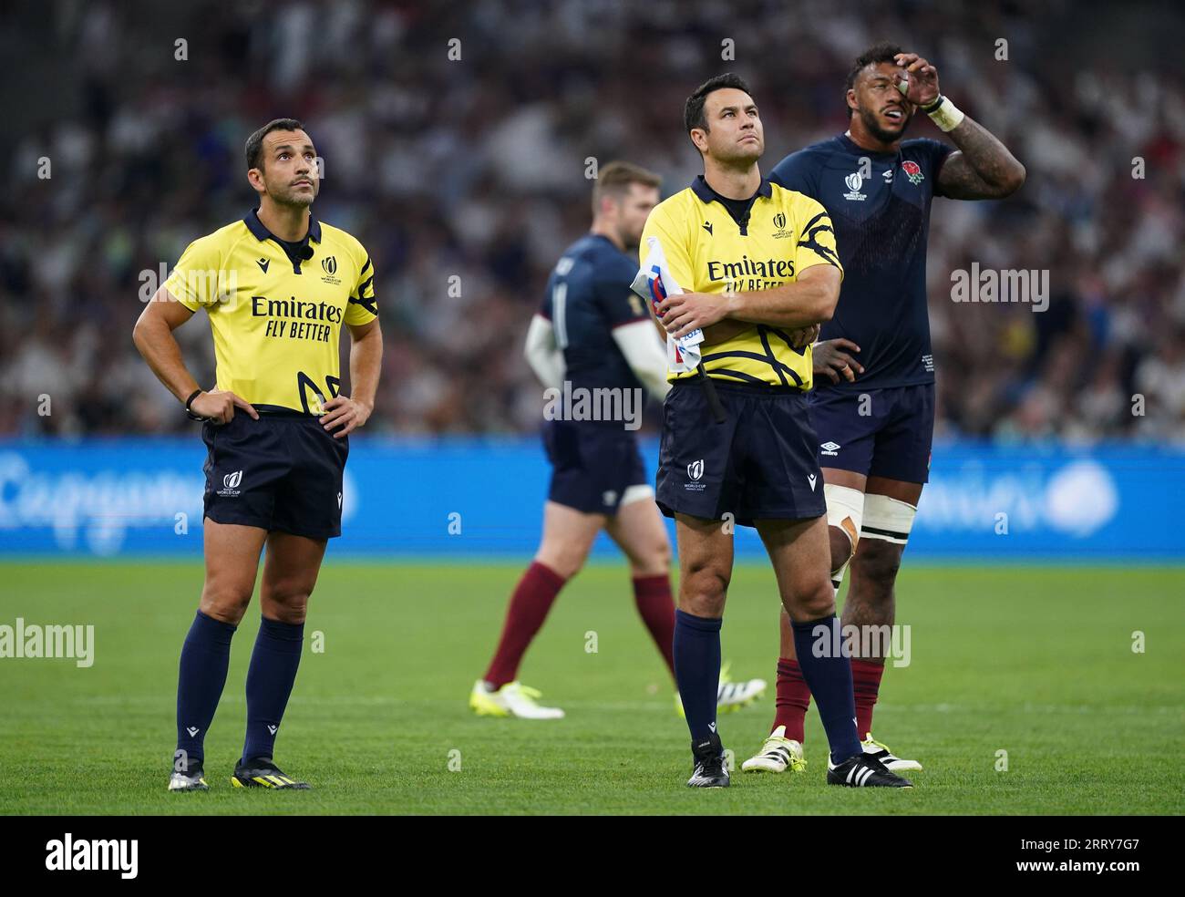 Referee Mathieu Raynal (left) waits for TMO review before a yellow card for England's Tom Curry (not pictured) during the 2023 Rugby World Cup Pool D match at the Stade de Marseille, France. Picture date: Saturday September 9, 2023. Stock Photo