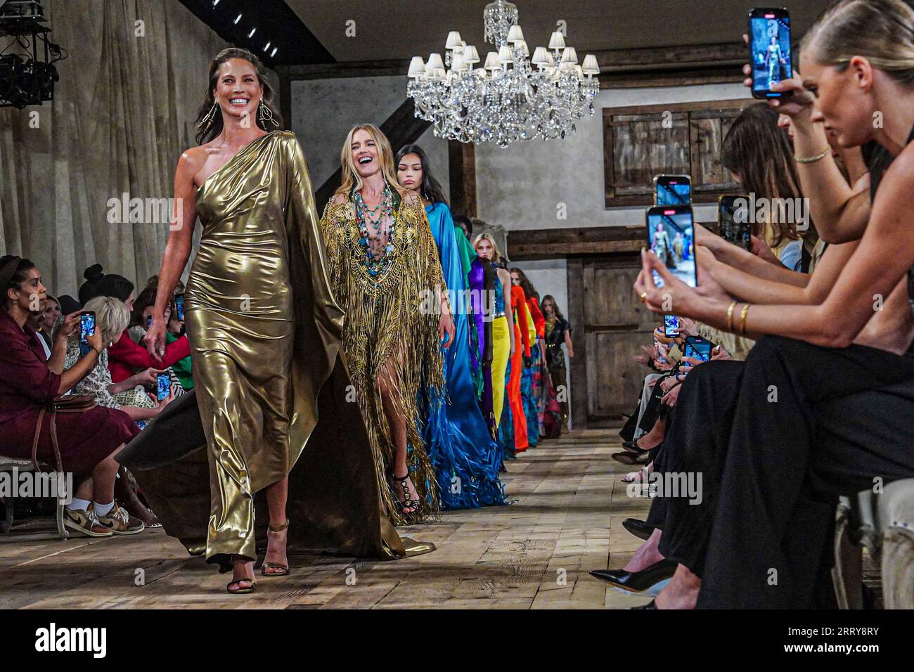Christy Turlington, left, lead models on their final walk on the runway ...