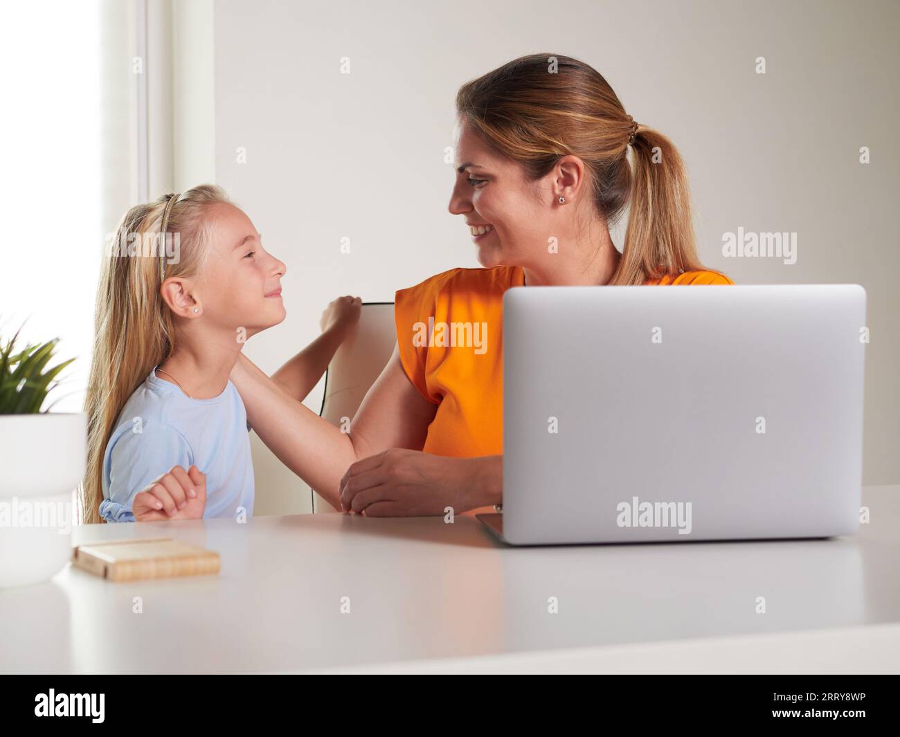 happy mother and daughter at home Stock Photo