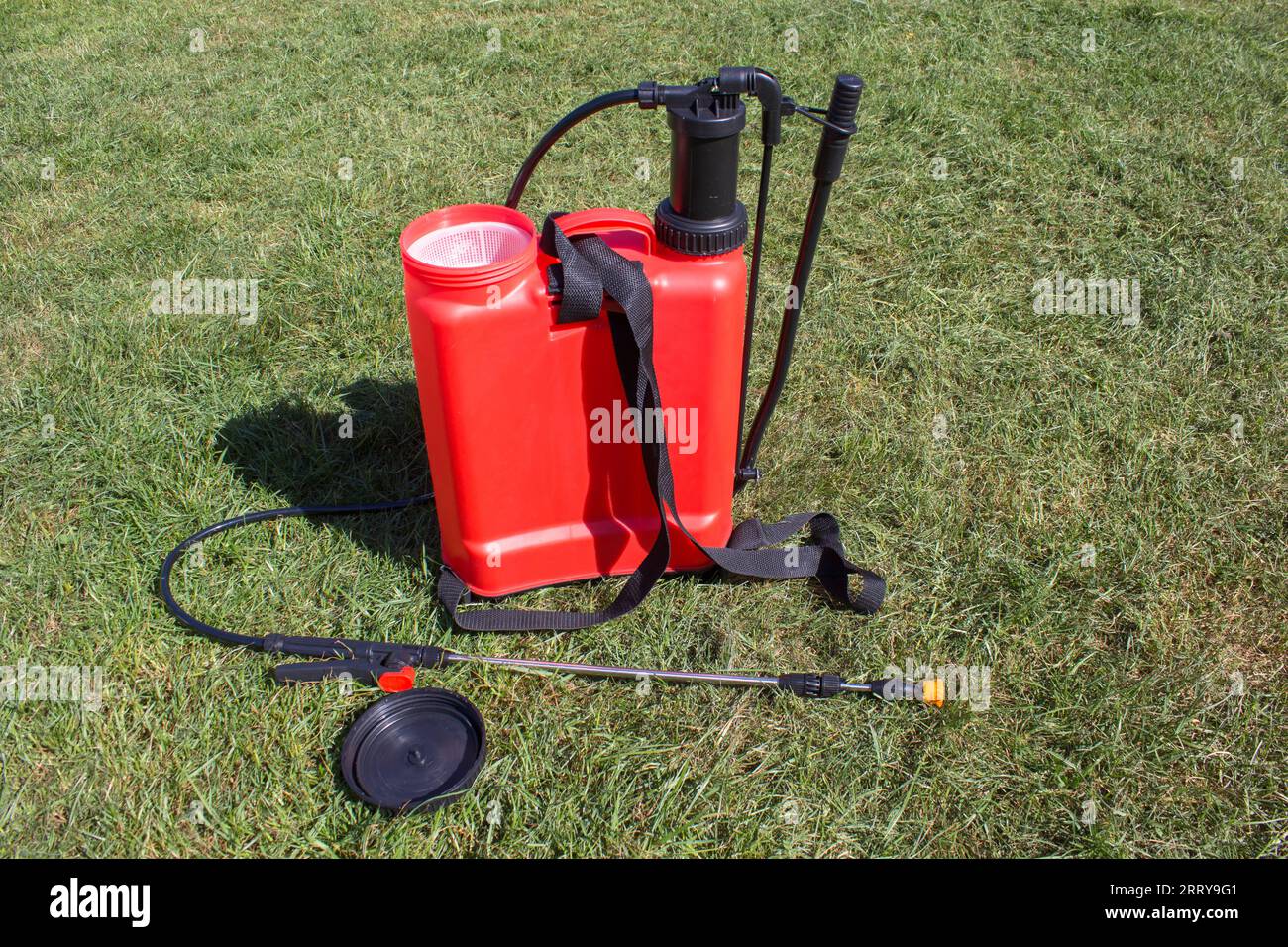 on the grass is an open sprayer for spraying herbicides Stock Photo