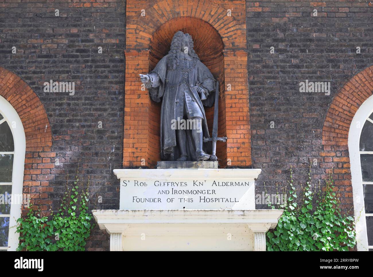 Statue of Sir Robert Geffrye (1613-1704) outside the Museum of the Home, which recently changed name due to his slavery connections, Shoreditch London Stock Photo