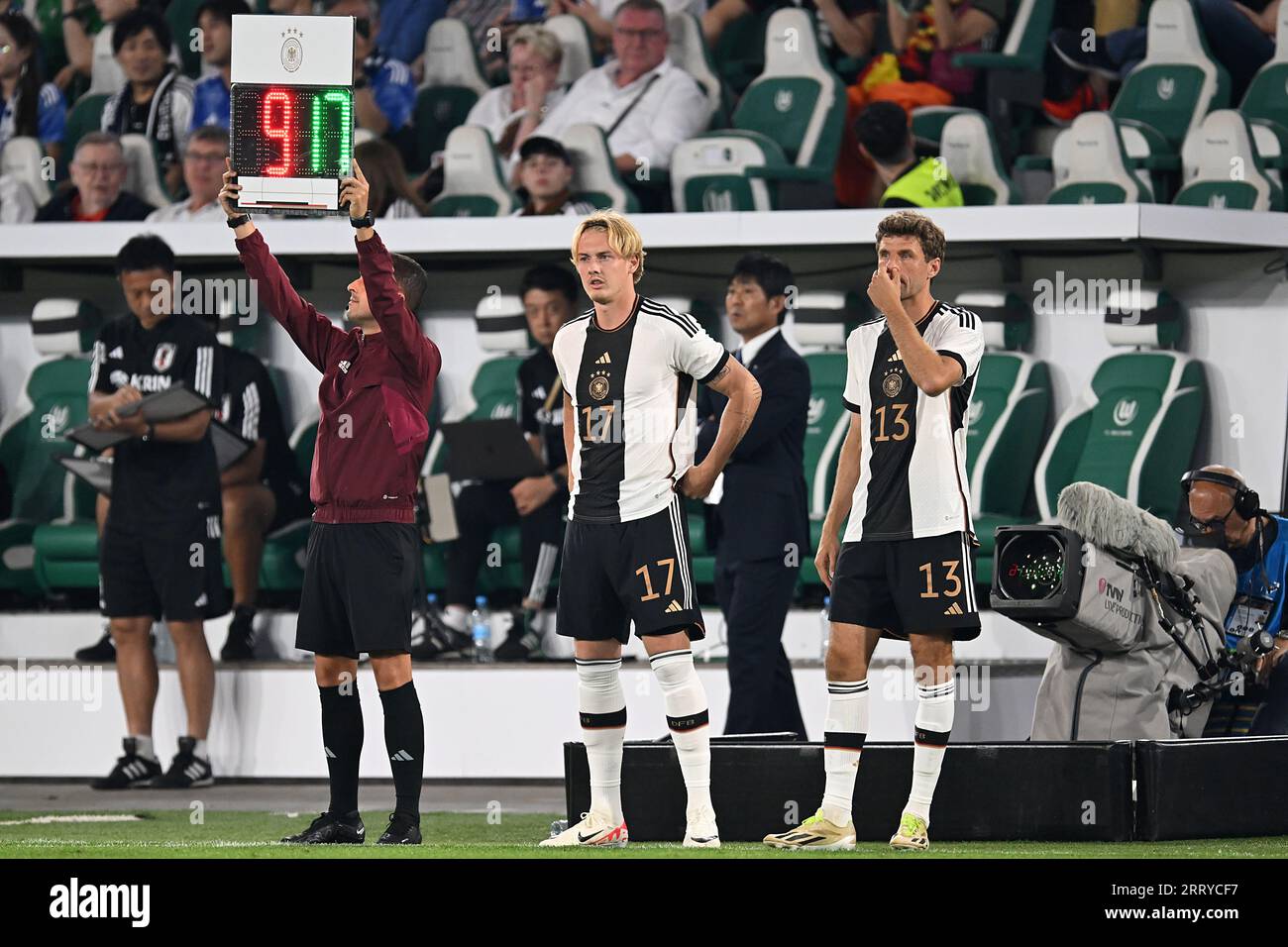 WOLFSBURG - (l-r), Julian Brandt of Germany, Thomas Muller of Germany during the friendly Interland match between Germany and Japan at the Volkswagen Arena on September 9, 2023 in Wolfsburg, Germany. ANP | Hollandse Hoogte | GERRIT VAN COLOGNE Stock Photo