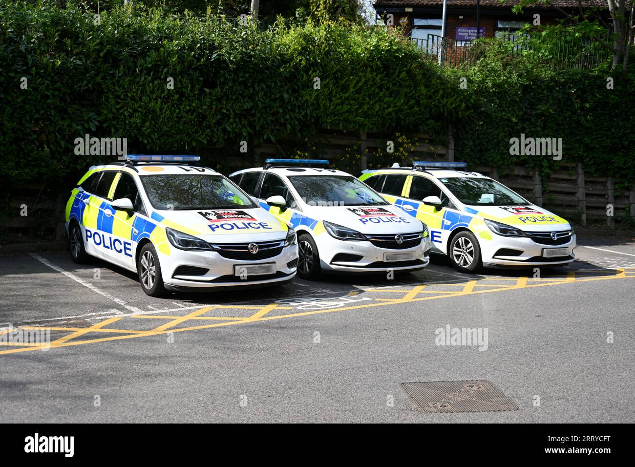 Police Vauxhall Astra Emergency Response cars with stop knife crime and hi-vis chevron Stock Photo