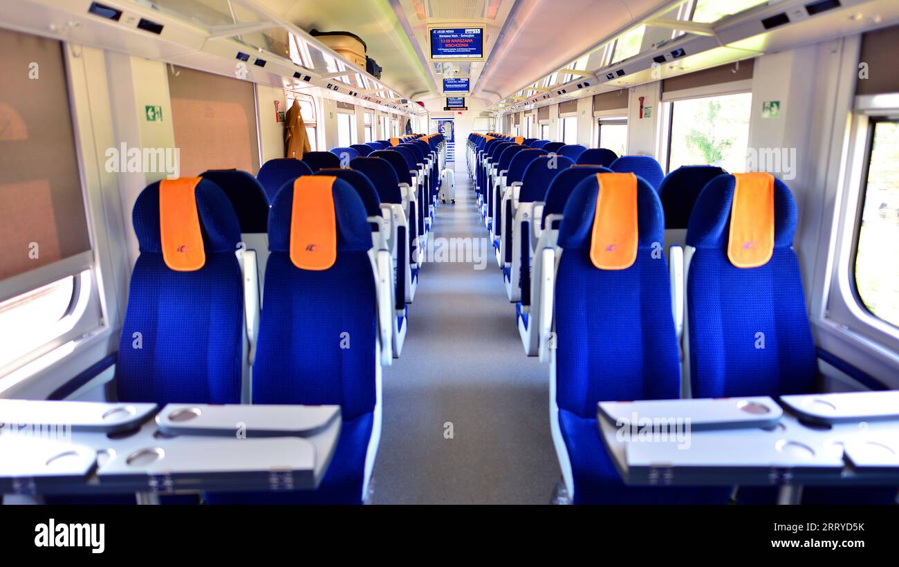 Warsaw, Poland. 7 September 2023. Interior of a passenger train. Empty chairs in the wagon. PKP Intercity. Stock Photo