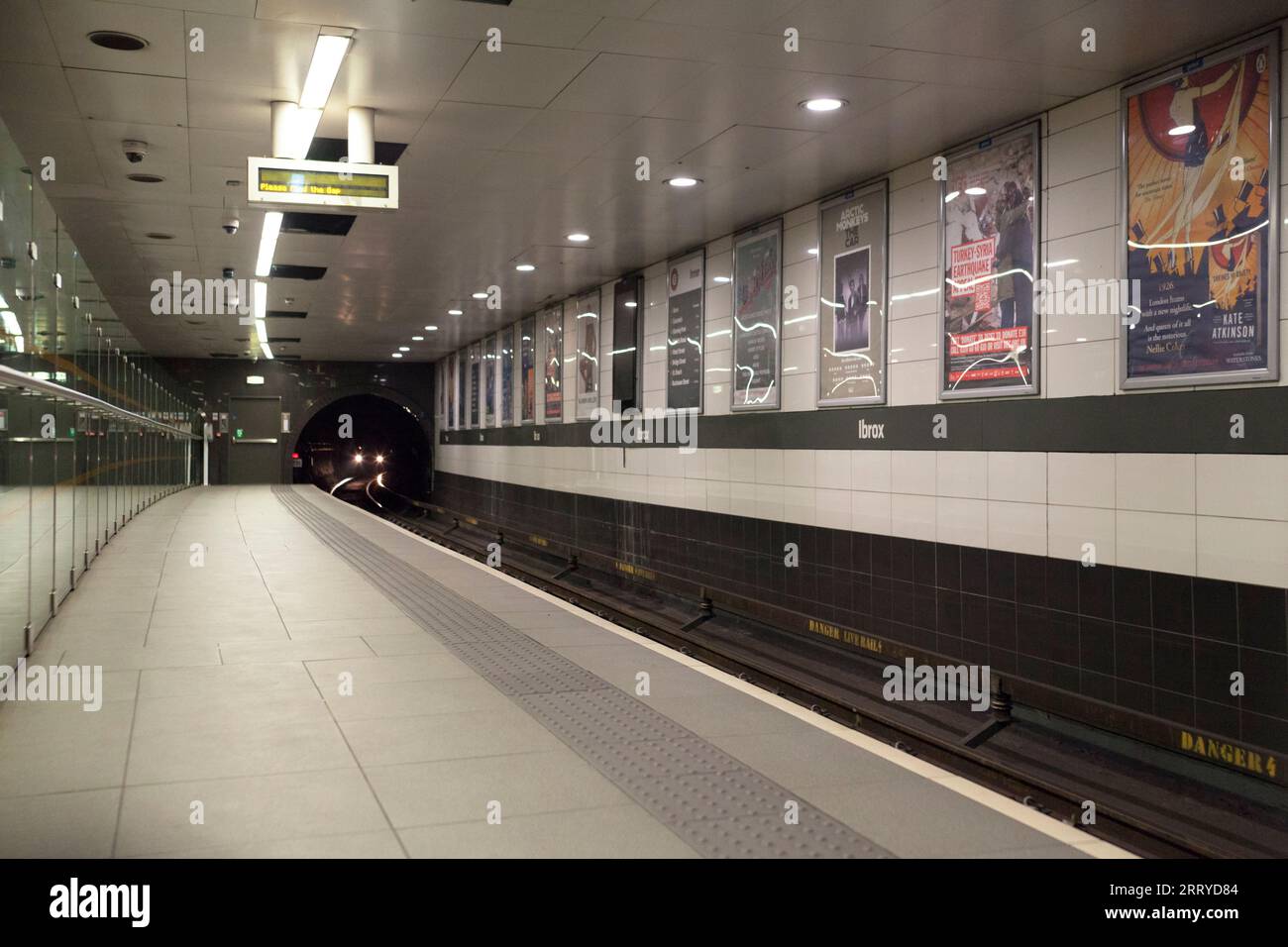 SPT subway train approaching Glasgow Ibrox underground station on the