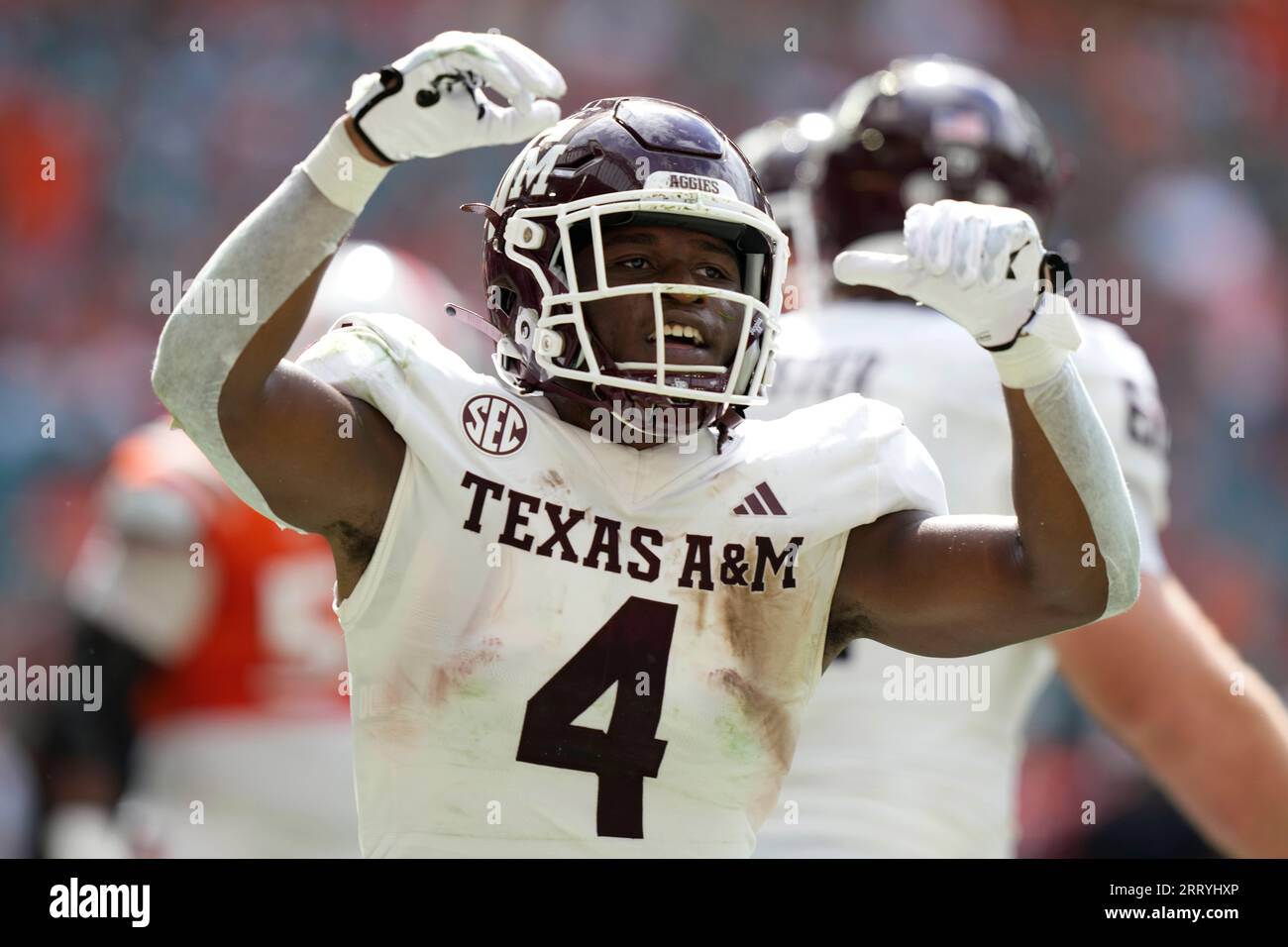 Texas A&M running back Amari Daniels (4) celebrates after scoring a