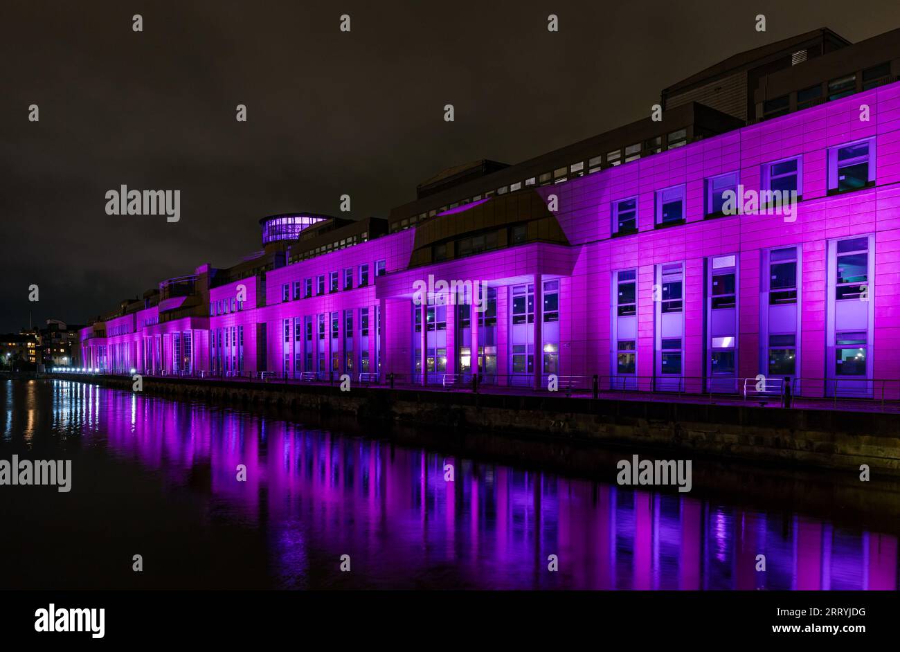 Leith, Edinburgh, Scotland, UK, 09 September 2023, Victoria Quay Lights Up: the Scottish Government building at Victoria Quay is one of a number of buildings lit up in pink light during the night in celebration of the Edinburgh Moonwalk which is taking place during the night. Credit: Sally Anderson/Alamy Live News Stock Photo