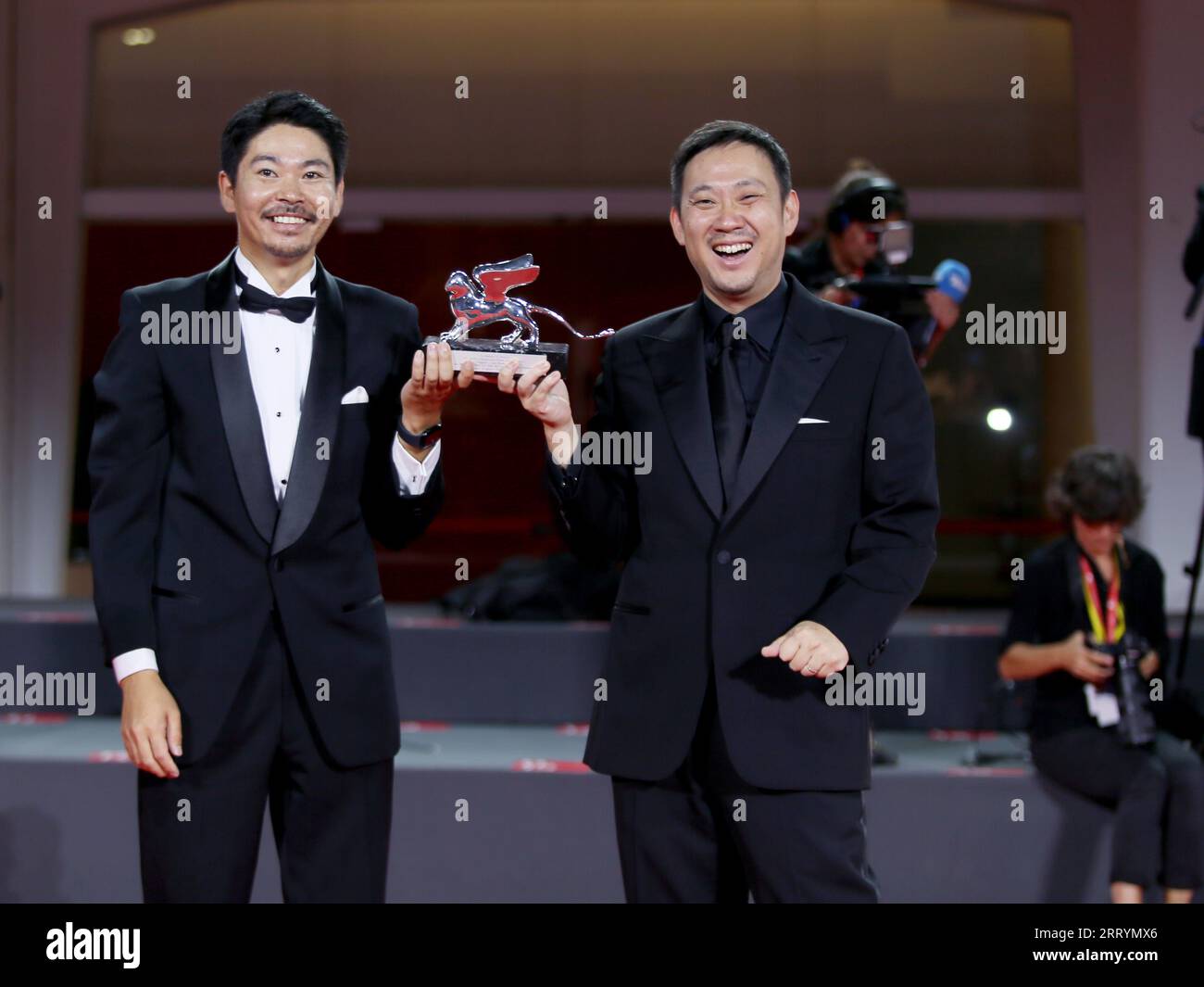 Venice, Italy. 10th Sep, 2023. evening 11. Red Carpet Closing Ceremony. In Hitoshi Omika and Ryûsuke Hamaguchi Credit: Independent Photo Agency/Alamy Live News Stock Photo