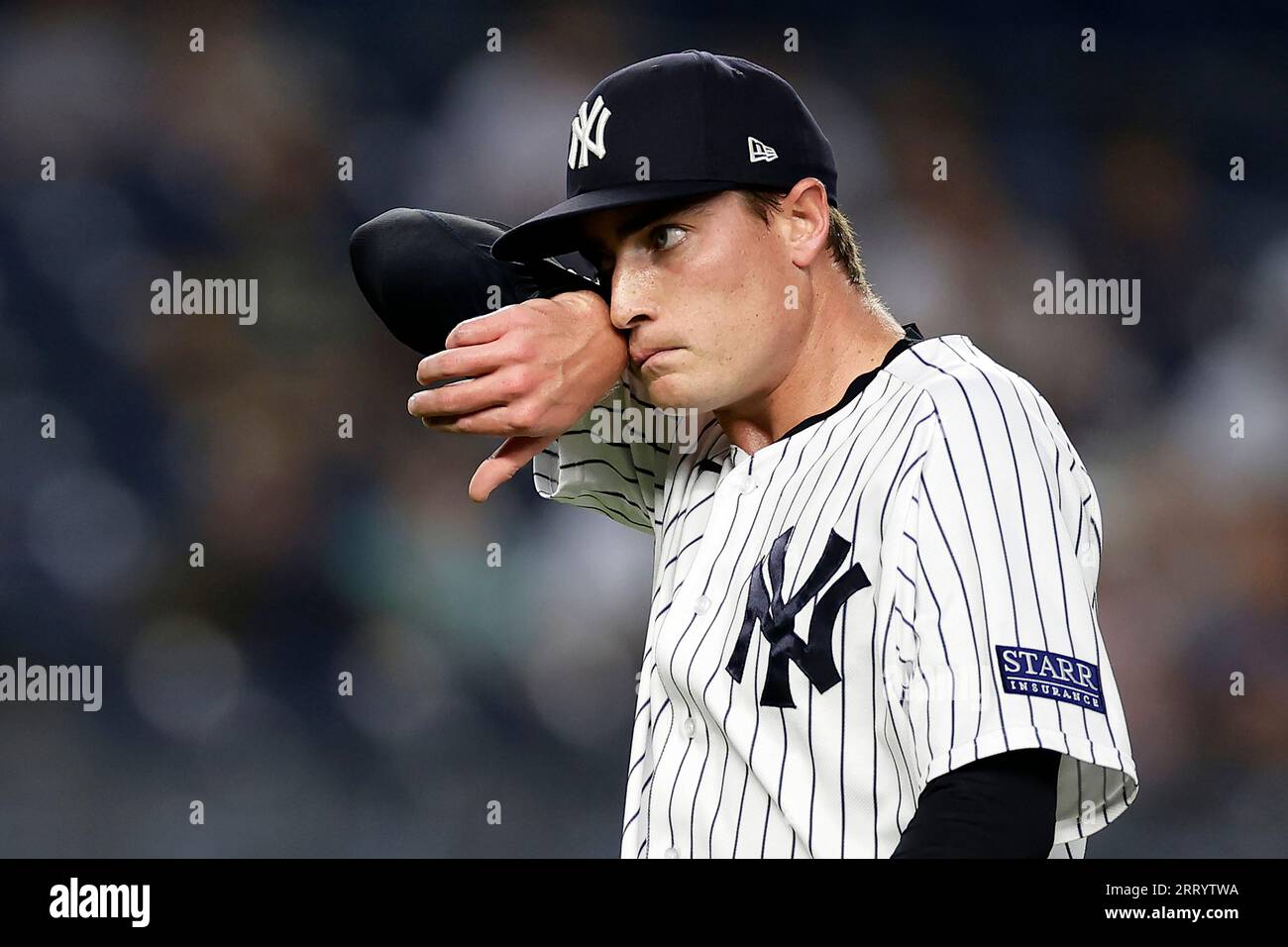 New York Yankees pitcher Ron Marinaccio reacts on the mound during