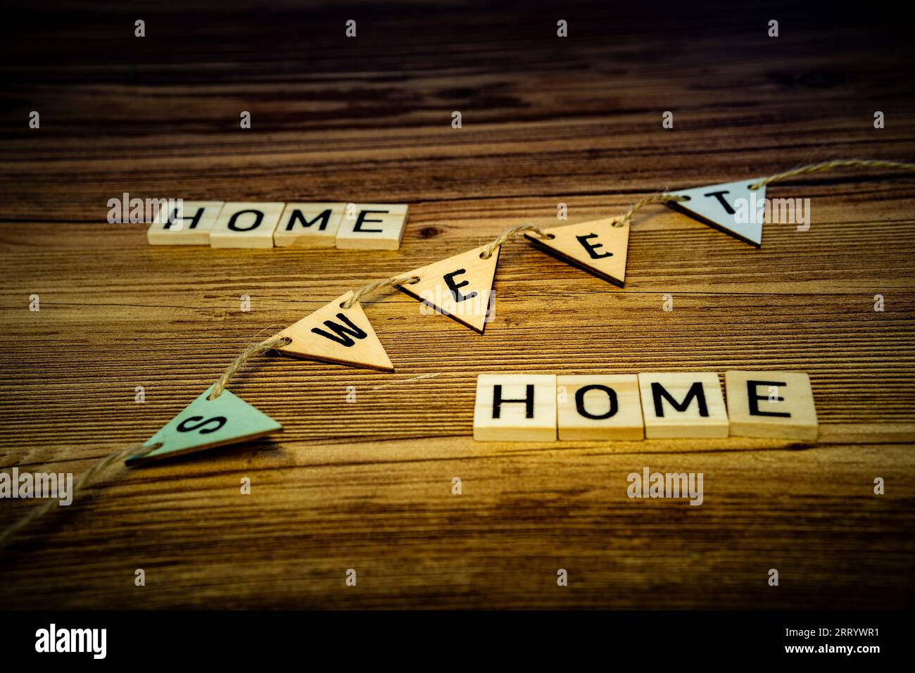 home sweet home in wooden letters on a wooden background Stock Photo